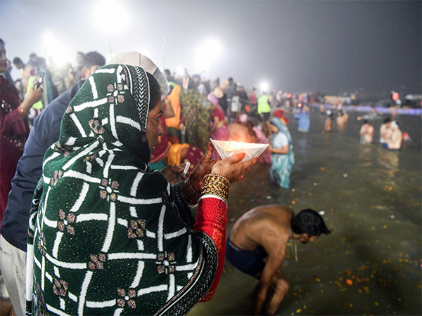 Devotees take a dip at Triveni Sangam on the occasion of ‘Paush Purnima’ during Maha Kumbh 2025 (Photo/ANI)