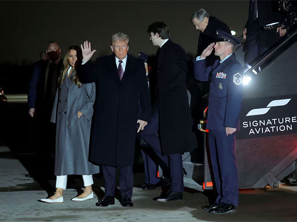 US President-elect Donald Trump, Melania and son Barron arrive at Dulles International Airport in Virginia (Image/Reuters)