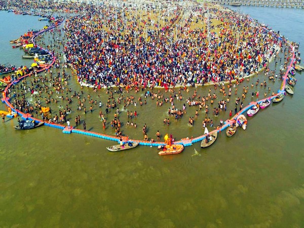 Devotees take a holy dip at Sangam in Prayagraj (File Photo/ANI)