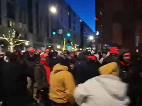 People gather outside US Capitol Rotunda building (IPhoto/ANI)