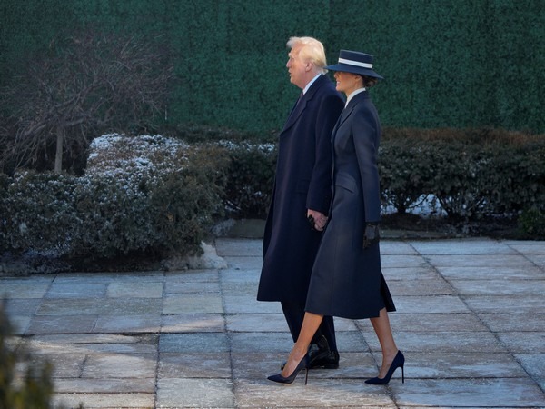 US President Donald Trump and his wife Melania Trump walk after attending church service (Image Credit: Reuters)