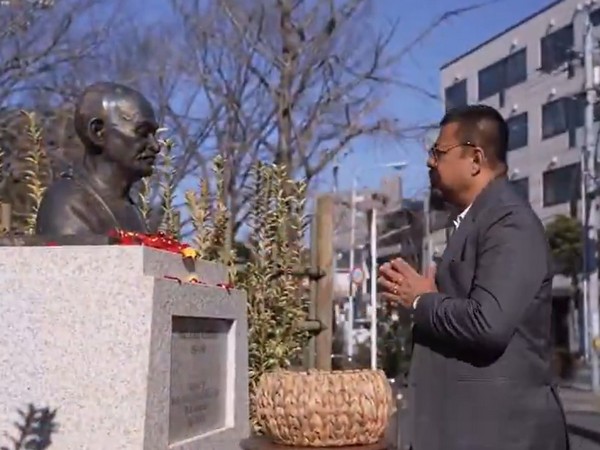 Assam Chief Minister Himanta Biswa Sarma paying tribute to Mahatma Gandhi’s statue in Tokyo. (Photo: Assam CMO)