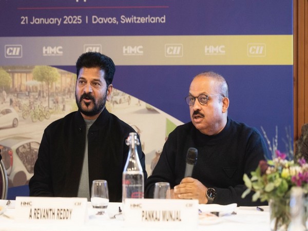 Telangana CM Revanth Reddy with HMC's Pankaj M Munjal (Photo/ANI)