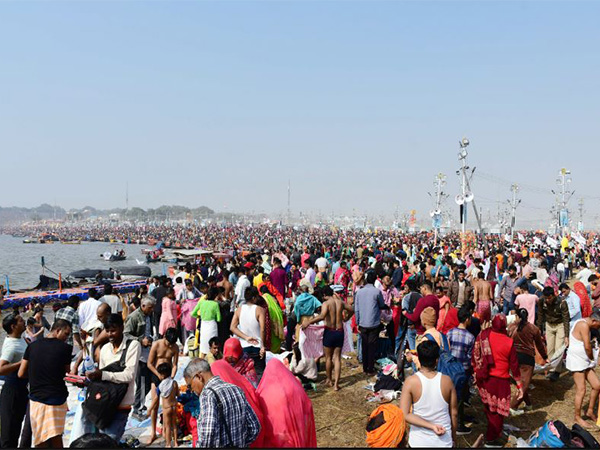 Devotees taking holy dip at Sangam (Photo/ANI)
