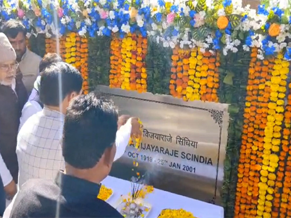 MP CM Mohan Yadav paying floral tribute to Rajmata Vijay Raje Scindia statue at Gwalior airport (Photo/ANI) 