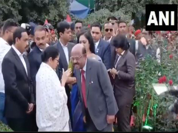 West Bengal CM Mamata Banerjee talking with Governor CV Ananda Bose at Raj Bhawan on Sunday. (Photo/ANI)