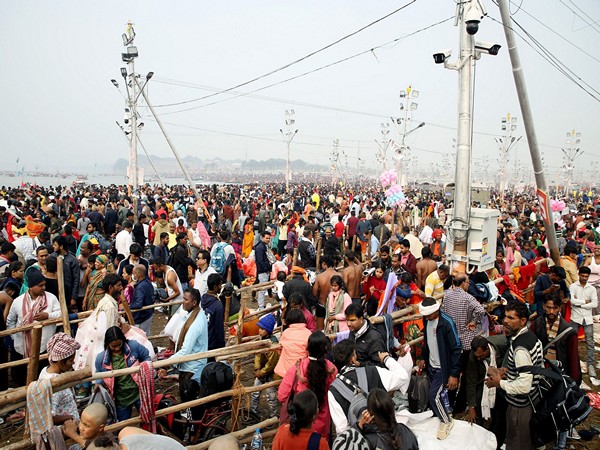 Devotees gather to take a dip at Triveni Sangam. (Photo/ANI)