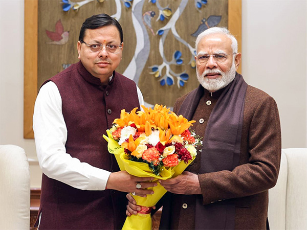 Uttarakhand CM Pushkar Singh Dhami with PM Modi (Photo/ANI)