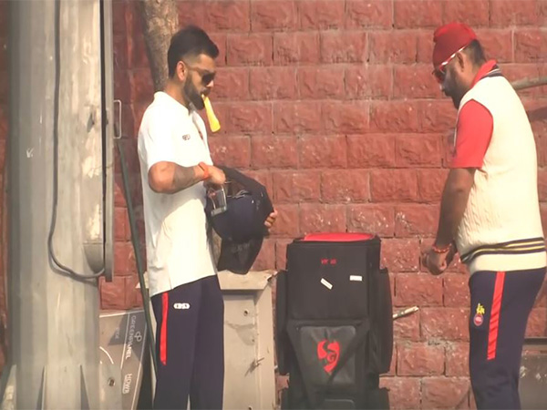 Virat Kohli and Sarandeep Singh (Photo: ANI)