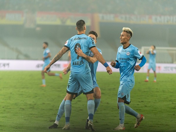 MCFC's Nikos Karelis celebrating wtih team mates Thaer Krouma and Bipin Singh Thounaojam after scoring (Photo: ISL Media)