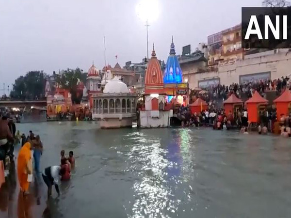 Devotees take a holy dip in river Ganga at Har Ki Pauri in Haridwar (Photo/ANI)