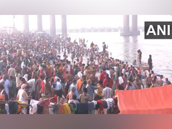 Devotees take a holy dip on the occasion of Basant Panchami. (Photo/ANI)
