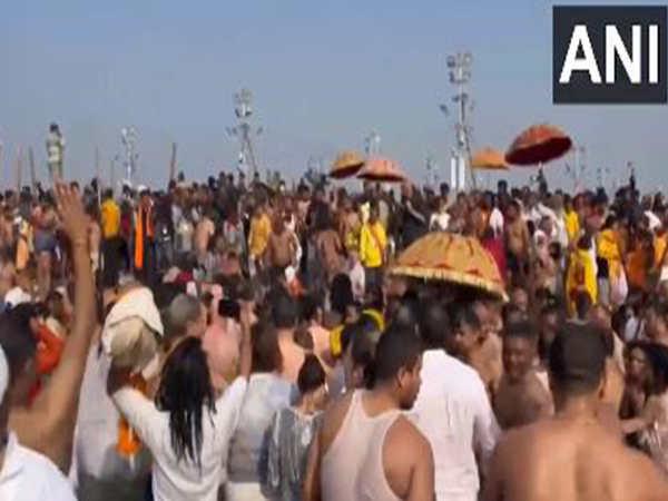 Saints and devotees in Kumbh area (Photo/ANI)