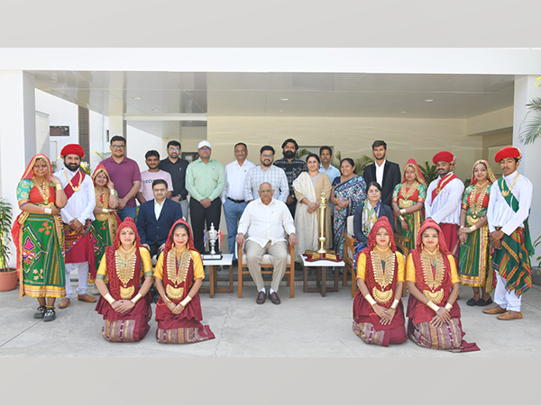 Gujarat CM Bhupendra Patel congratulates tableau artists for securing third place.(Photo/GujaratCMO)