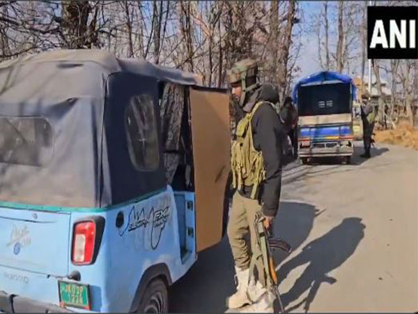 Security personnel conduct security checks after killing of ex-serviceman in Kulgam (Photo/ANI)