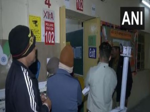 Voters queue up at a polling booth in Lodhi Road to cast their votes for 2025 Delhi Assembly elections. (Photo/ANI)