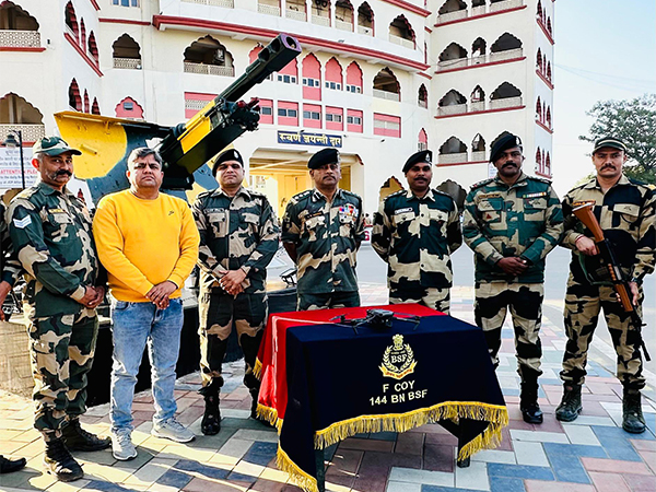 BSF personnel with the seized drone (@BSF_Punjab)