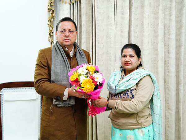 Uttarakhand CM Pushkar Singh Dhami with Shayra Bano (Photo/ANI)