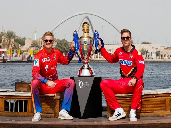Sam Billings (L) and Lockie Ferguson (R) with the International League T20 trophy. (Photo: ILT20)