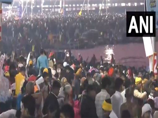Visual of devotees at the Triveni Sangam (Photo/ANI)