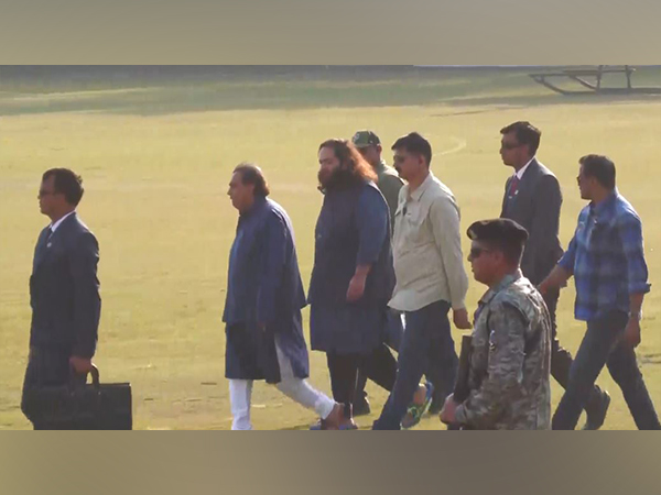 Mukesh Ambani with son Anant Ambani in Prayagraj (Photo/ANI)