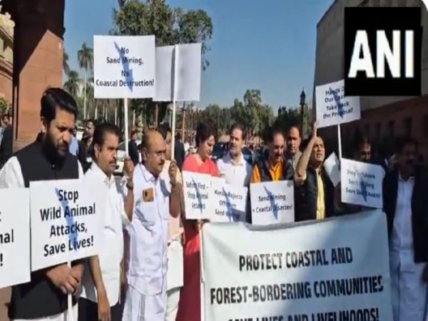 Congress MPs protested over the protection of coastal and forest-bordering communities of Kerala in the Parliament House complex (Photo/ANI)