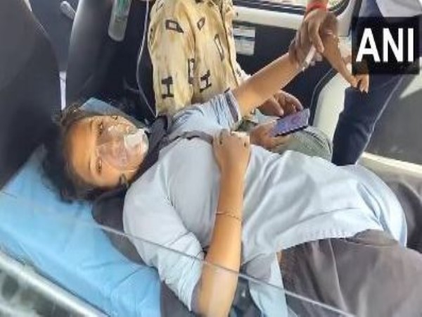 A girl student being taken to hospital after falling ill following ammonia gas leak (Photo/ANI) 