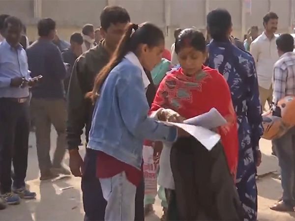 Students and Parents outside an exam centre in Patna (Photo/ANI)