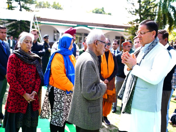 CM Pushkar Dhami meets IGP Kewal Khurana's bereaved family (Photo/ANI) 
