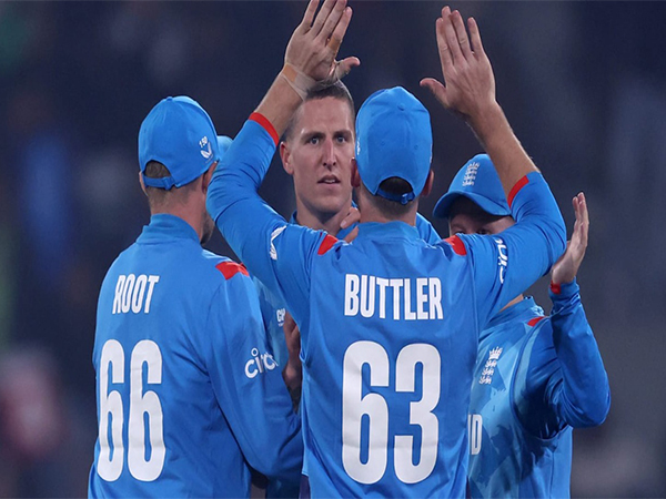 Brydon Carse celebrating with England players (Photo: ICC) 