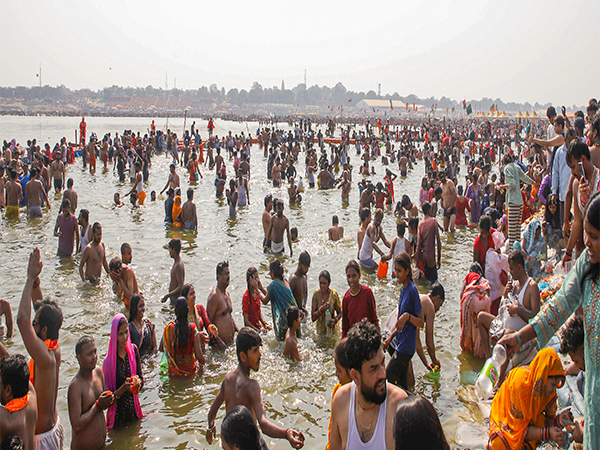 Devotees take a dip at Triveni Sangam during the ongoing 'Mahakumbh Mela 2025 (Photo/ANI)