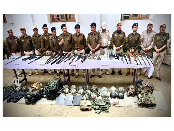 Police with surredered weapns (Photo/Manipur Police)