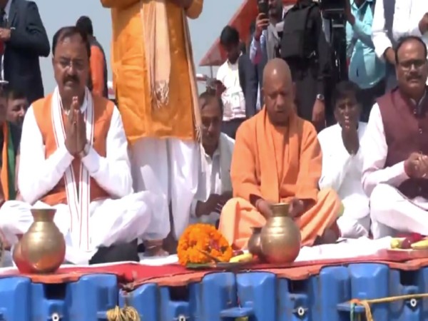 UP CM Yogi Adityanath with his cabinet members at Arail Ghat (Photo/ANI)