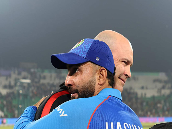 Jonathan Trott and Hashmatulah Shahidi (Photo: ICC)