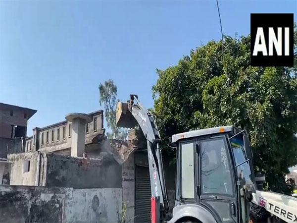 Illegal construction of two drug peddlers demolished in Jalandhar. (Photo/ANI)