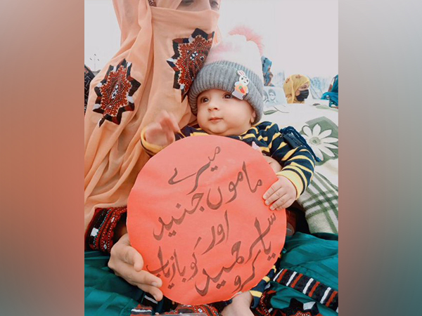 A protester with her child in Hub (Image: X@MahrangBaloch_)