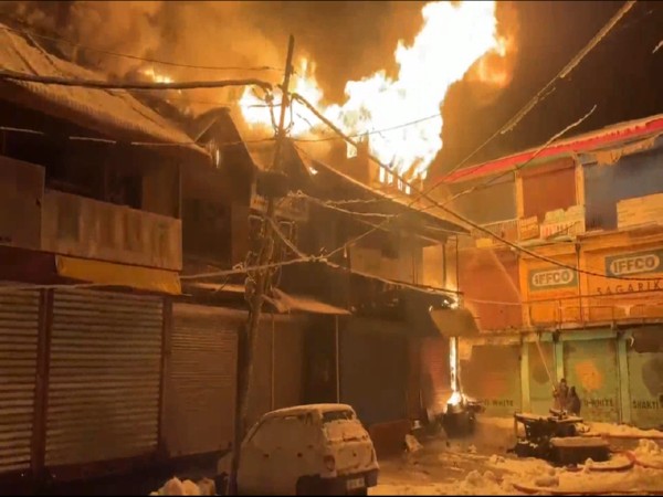 Fire broke out in shops in Shopian (Photo/ANI)