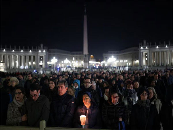 Faithful attend a prayer service in St. Peter's Square, as Pope Francis continues his hospitalization at the Vatican (Image/Reuters)