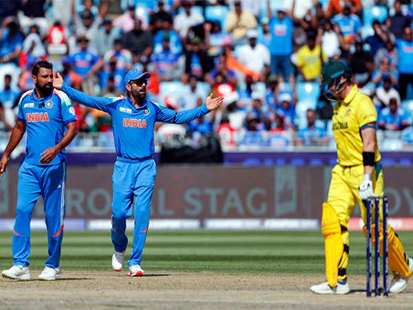 Virat Kohli in action with Shami (Photo: ANI) 