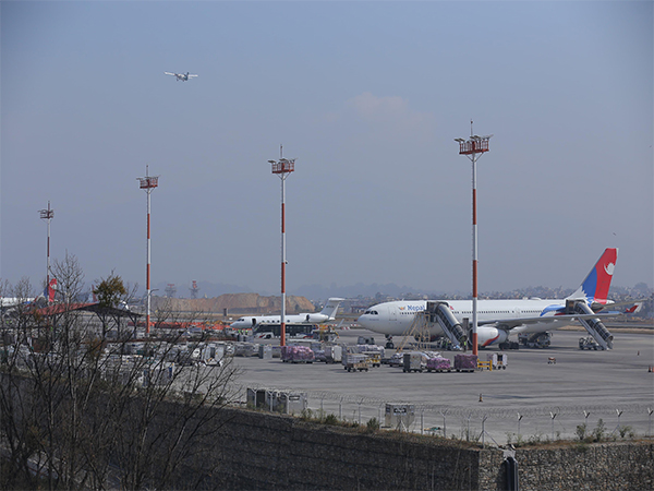 The chartered aircraft of Gryphon Air carrying deported Nepali nationals is parked in the parking bay of Tribhuvan International Airport in Kathmandu on March 5 (Image/ANI)