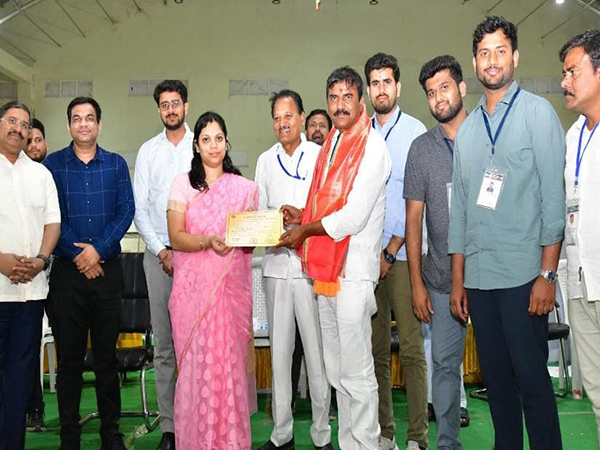 Chinnamile Anji Reddy receives the Certificate of Election from Karimnagar Collector.(Photo/Karimnagar DPRO)