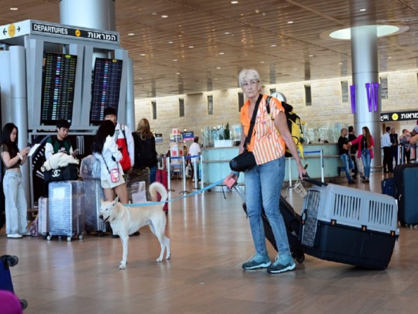 Travellers at Ben Gurion Airport (File Image) (Photo Credit: TPS) 