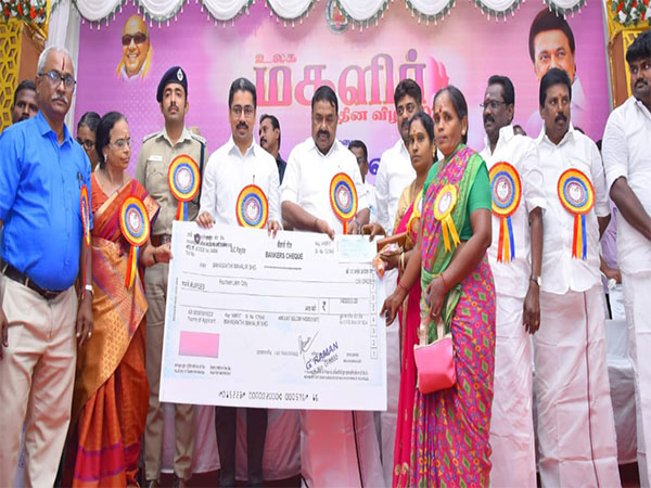 Tamil Nadu Dairy Minister RS Rajakanappan distributes loan assistance to women self-help groups. (Photo/ANI)