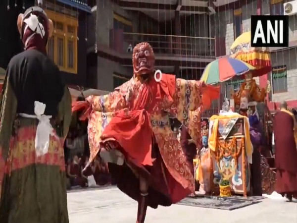 Tibetan Buddhist monks perform traditional Cham at Tsechu Fair in Mandi (Photo/ANI)
