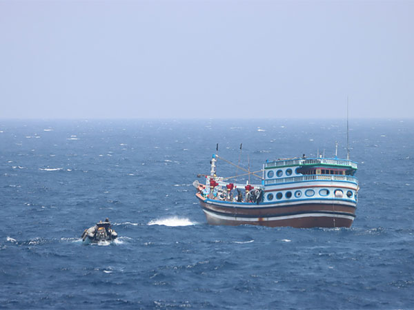 INS Tarkash providing assistance to an Iranian dhow in the Indian Ocean. (Photo: Indian Navy)