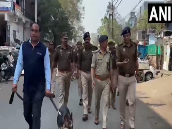 Noida police conducts flag march (Photo/ANI)