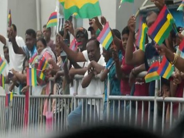 People lined up on roads of Mauritius to catch a glimpse of PM Modi (Photo/ANI) 