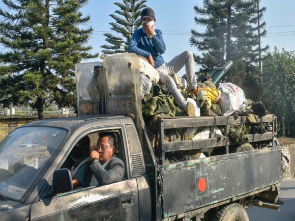 Arambai Tenggol hands over arms and ammunition to security officials (Photo/ANI)