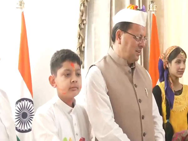 Pushkar Singh Dhami celebrates Holi at his residence (Photo; ANI) 