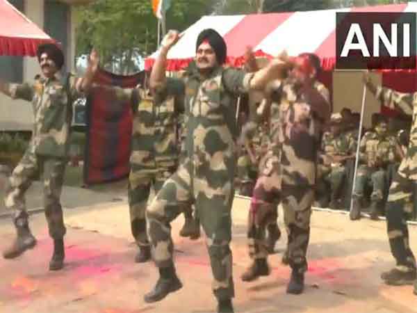 BSF personnel celebrating Holi in Tripura (Photo/ANI)